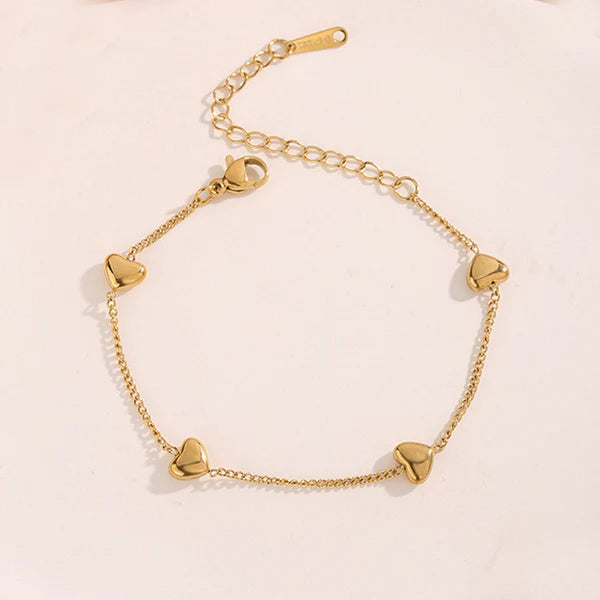 Svarnika Jewels Gold Plated Stainless Steel Anti Tarnish Heart Themed Wraparound Bracelet For Women