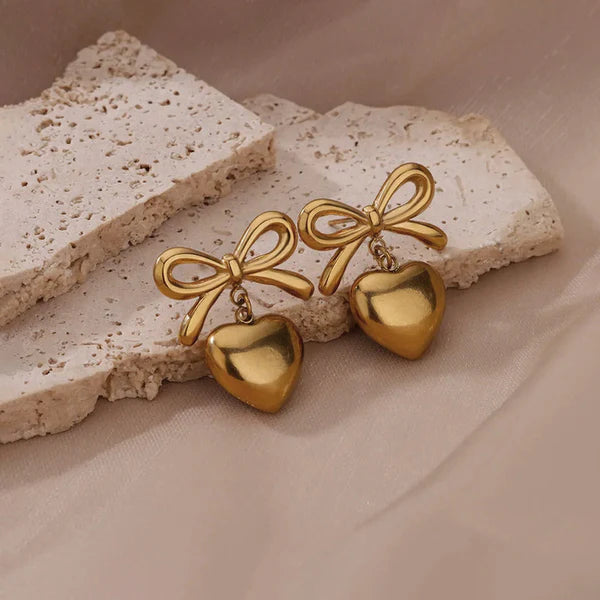 Svarnika Jewels Gold Plated Anti Tarnish Bow-Heart Themed Earrings