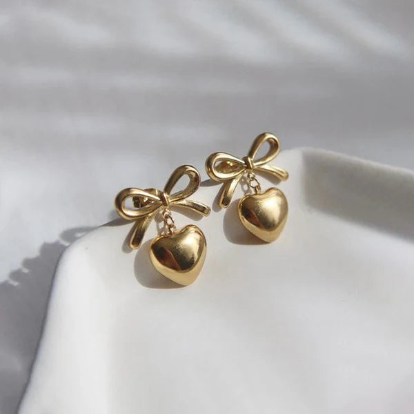 Svarnika Jewels Gold Plated Anti Tarnish Bow-Heart Themed Earrings
