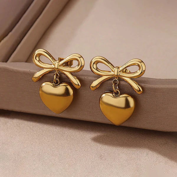 Svarnika Jewels Gold Plated Anti Tarnish Bow-Heart Themed Earrings