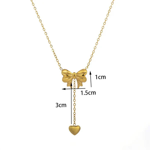 Svarnika Jewels Gold Plated Stainless Steel Anti Tarnish Heart Themed Bow Inspired Pendant Necklace