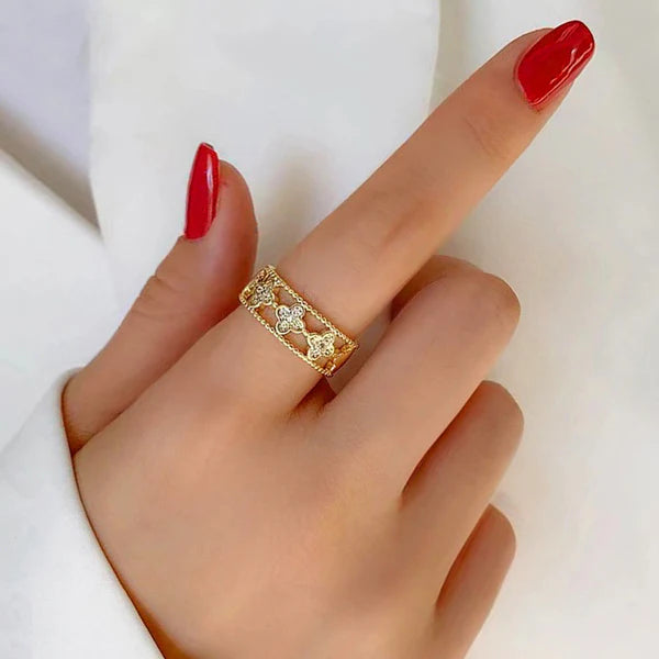 Svarnika Jewels Gold Plated Anti Tarnish Stainless Steel Clover Themed Adjustable Finger Ring