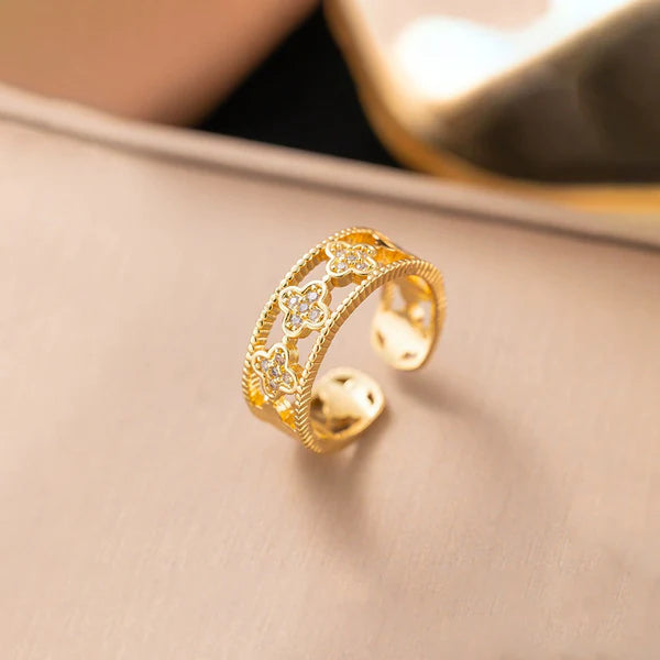 Svarnika Jewels Gold Plated Anti Tarnish Stainless Steel Clover Themed Adjustable Finger Ring