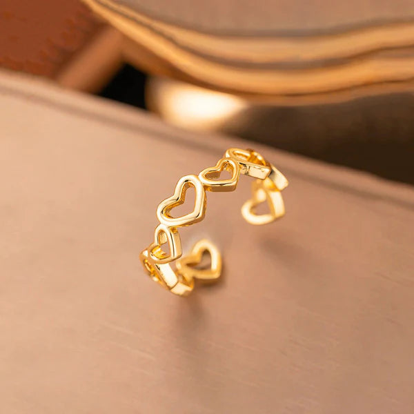 Svarnika Jewels Gold Plated Anti Tarnish Stainless Steel Heart Themed Adjustable Finger Ring