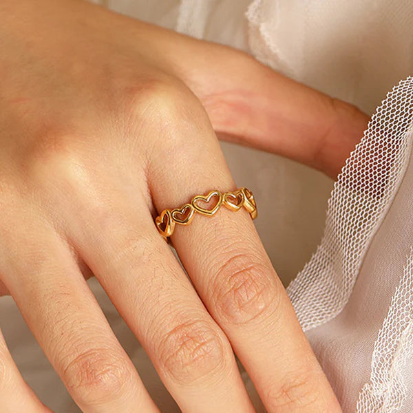 Svarnika Jewels Gold Plated Anti Tarnish Stainless Steel Heart Themed Adjustable Finger Ring