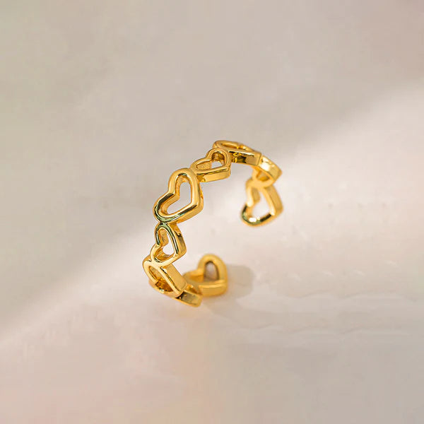 Svarnika Jewels Gold Plated Anti Tarnish Stainless Steel Heart Themed Adjustable Finger Ring
