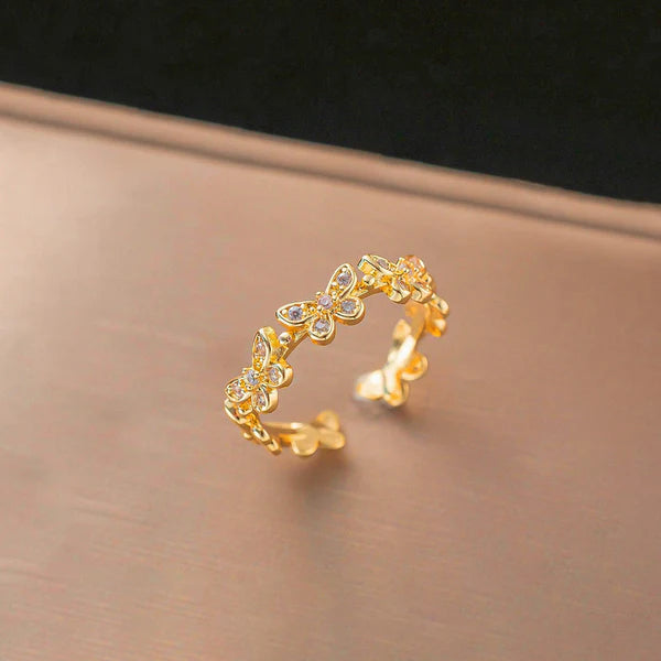 Svarnika Jewels Gold Plated Anti Tarnish Stainless Steel Butterfly Themed Adjustable Finger Ring