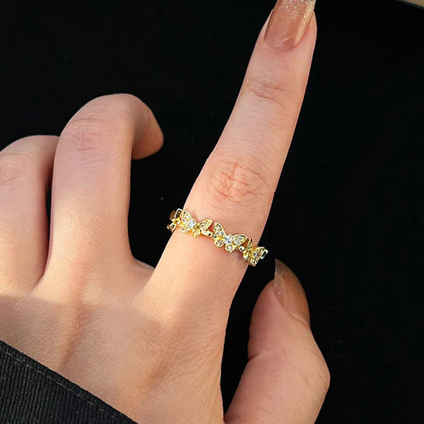 Svarnika Jewels Gold Plated Anti Tarnish Stainless Steel Butterfly Themed Adjustable Finger Ring