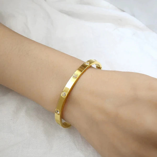 Svarnika Jewels Stainless Steel Contemporary Gold Plated Love AD Anti-Tarnish Bracelet For Women