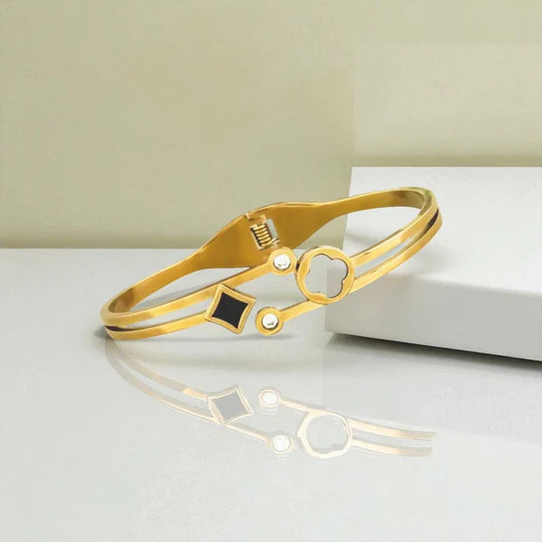 Svarnika Jewels Gold Plated Stainless Steel Clover Themed Anti Tarnish Bangle Style Bracelet