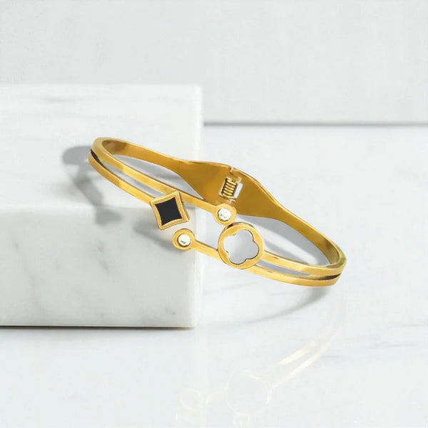 Svarnika Jewels Gold Plated Stainless Steel Clover Themed Anti Tarnish Bangle Style Bracelet