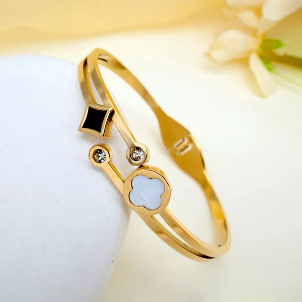 Svarnika Jewels Gold Plated Stainless Steel Clover Themed Anti Tarnish Bangle Style Bracelet
