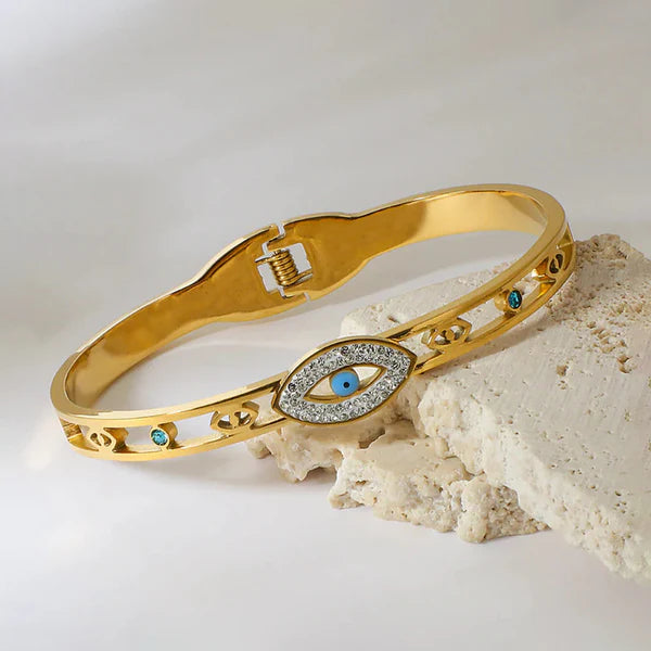 Svarnika Jewels Gold Plated Stainless Steel Evil Eye Themed Anti Tarnish Bangle Style Bracelet