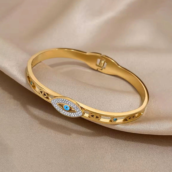 Svarnika Jewels Gold Plated Stainless Steel Evil Eye Themed Anti Tarnish Bangle Style Bracelet