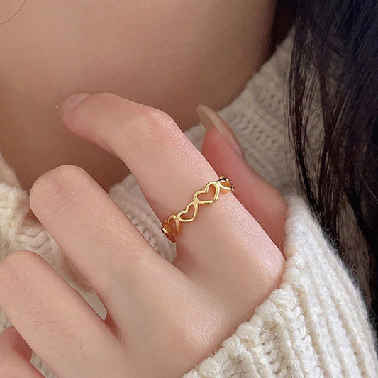 Svarnika Jewels Gold Plated Anti Tarnish Stainless Steel Heart Themed Adjustable Finger Ring