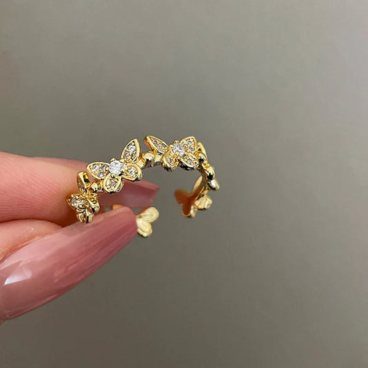 Svarnika Jewels Gold Plated Anti Tarnish Stainless Steel Butterfly Themed Adjustable Finger Ring