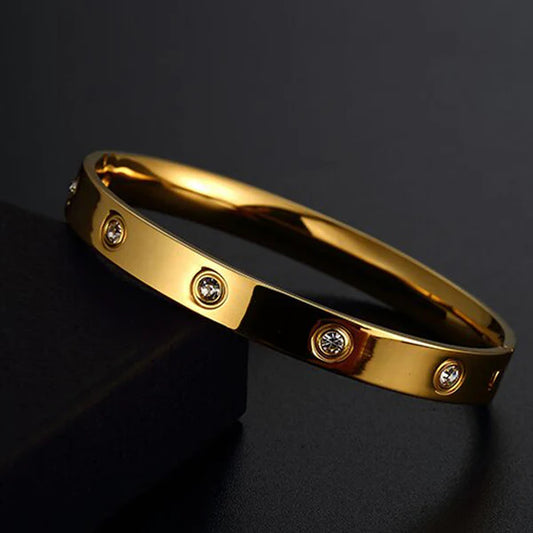 Svarnika Jewels Stainless Steel Contemporary Gold Plated Love AD Anti-Tarnish Bracelet For Women