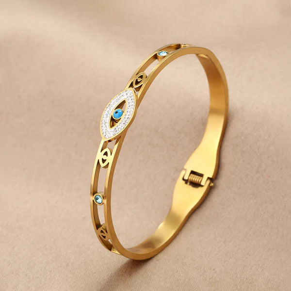 Svarnika Jewels Gold Plated Stainless Steel Evil Eye Themed Anti Tarnish Bangle Style Bracelet